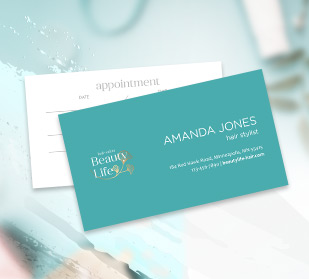 Beautiful, elegant and affordable spa and salon appointment business card on table.
