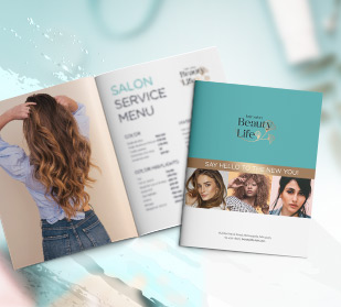 Full sized, multi-page, colorful, beautifully designed spa and salon booklets on cool background.